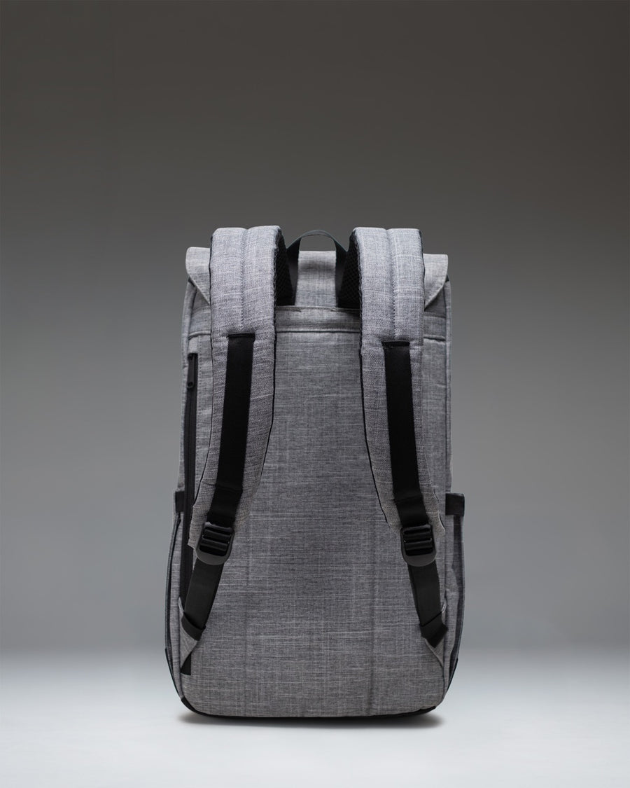 Herschel Retreat Backpack in Raven Crosshatch, featuring a classic cinch-top design with rubber strap closures.
