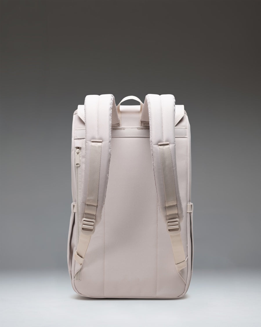 Herschel Retreat Backpack in Moonbeam colorway, featuring a classic cinch top design and dual magnetic strap closures.