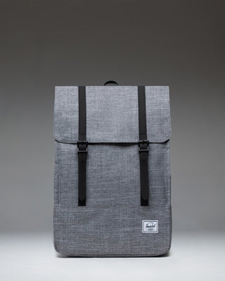 Herschel Survey Backpack in Raven Crosshatch gray with dual strap closures.
