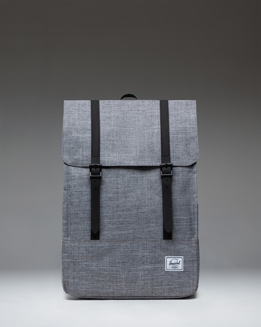 Herschel Survey Backpack in Raven Crosshatch gray with dual strap closures.