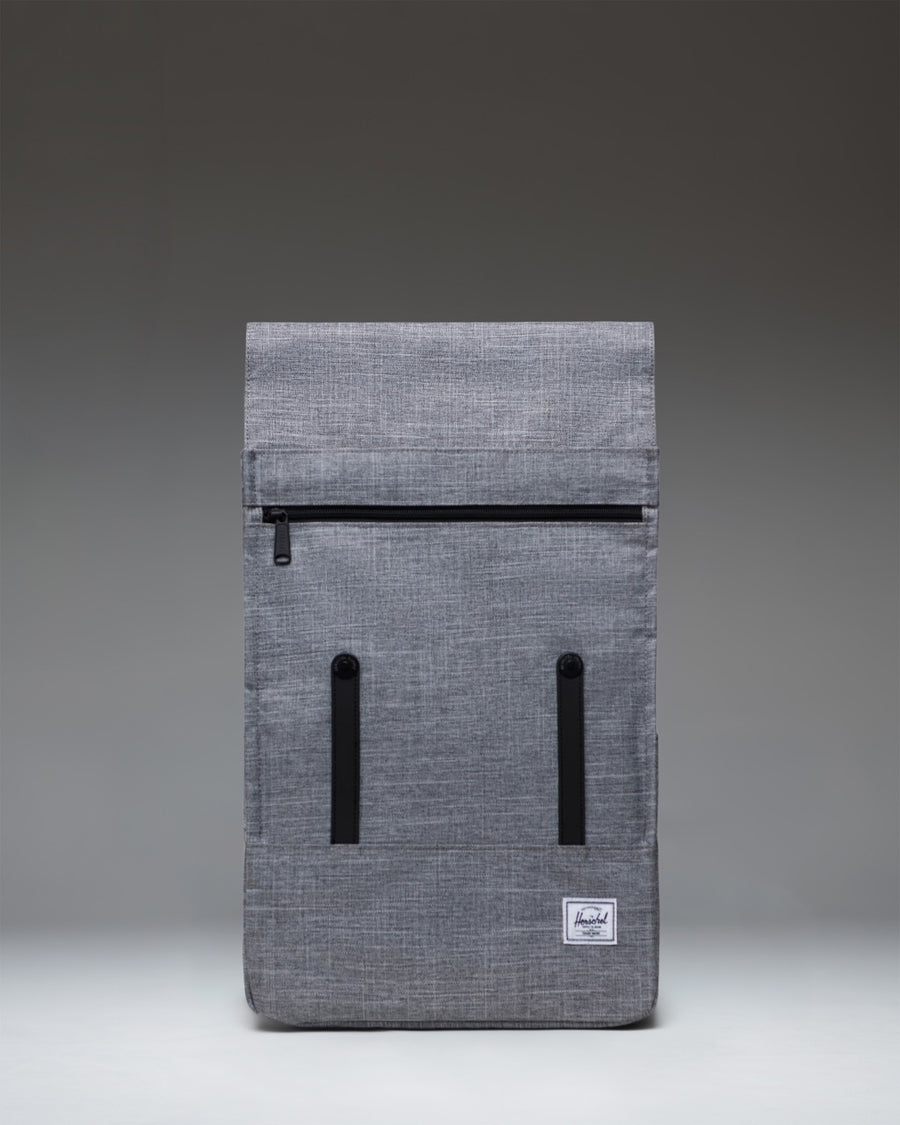 Herschel Survey Backpack in Raven Crosshatch featuring a minimalist design with a flap closure, perfect for carrying daily commute essentials.