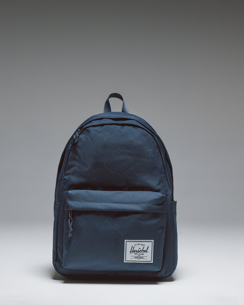 Herschel Classic XL Backpack in navy blue, shown from a front angle against a white background.