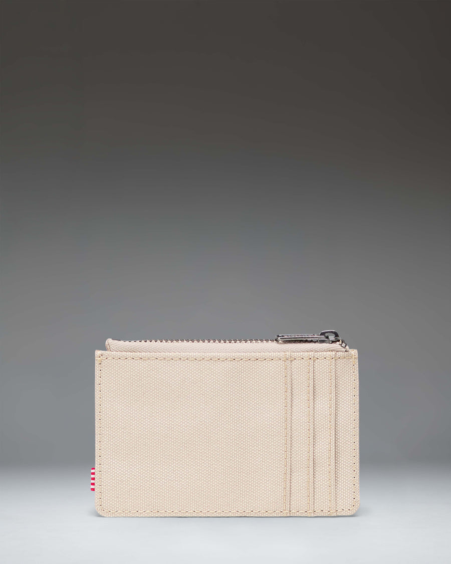 Herschel Supply Co Oscar Cardholder in Eucalyptus green.