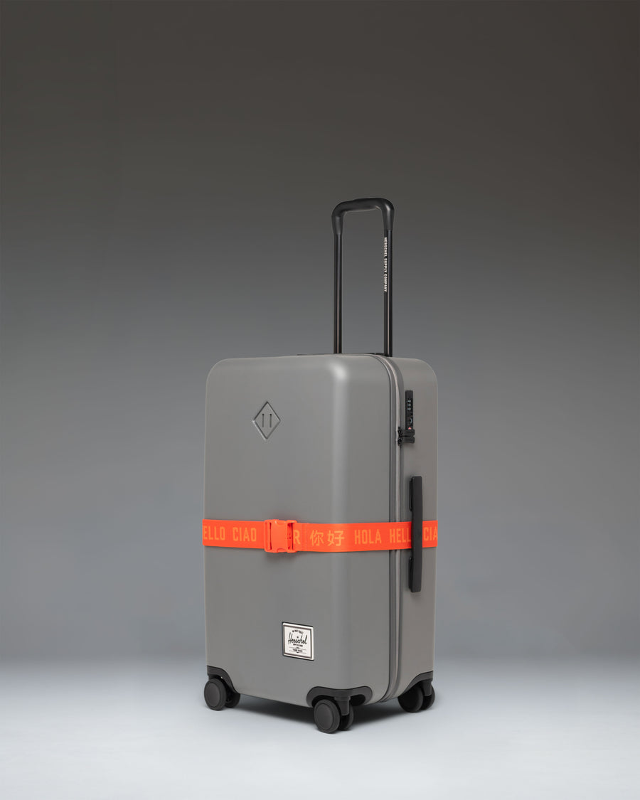 Herschel Supply Co. Luggage Belt in Tangerine Tango bright orange.