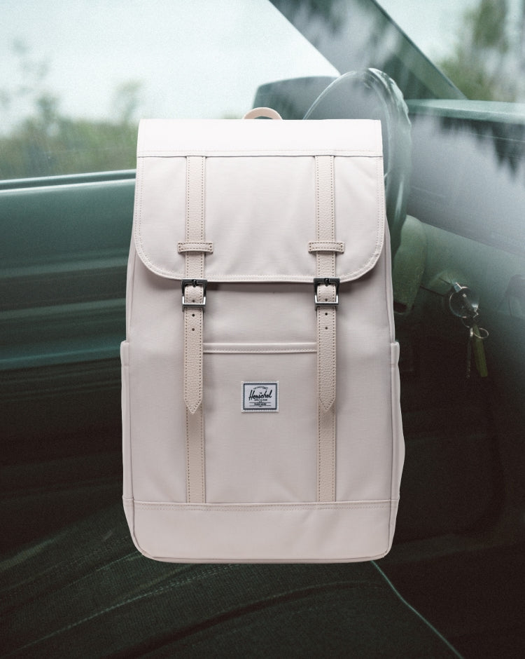 Herschel Retreat Backpack in Moonbeam color shown on a mobile screen.